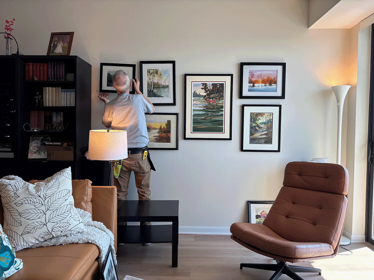 moving in hanging photos
