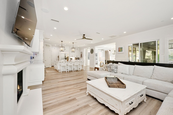 Modern staged living room and kitchen.