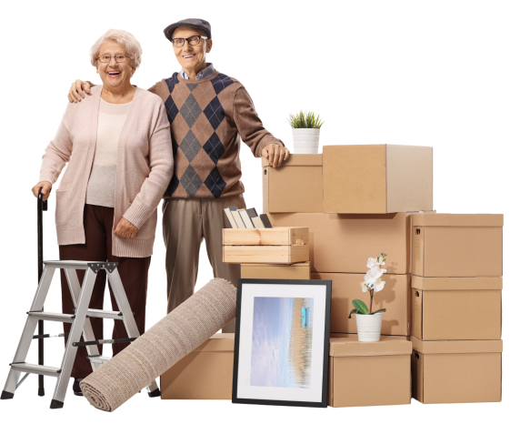 An elderly couple packing