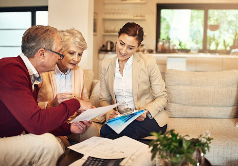 Professional consultant conversing with couple